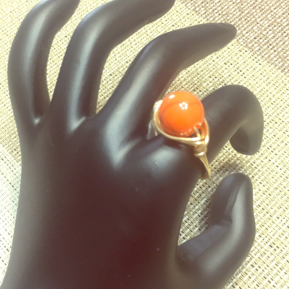 Orange beaded hand wrapped ring
